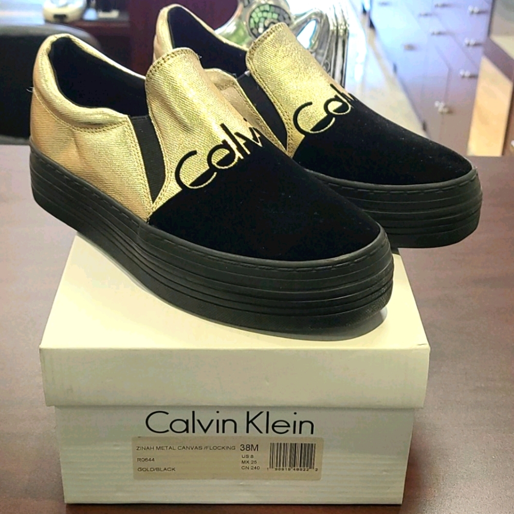SOLD- Brand new Calvin Klein canvas shoes. 8m. 9.5w